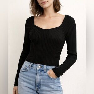 Cropped fitted black sweater. Women’s size XS. NWOT